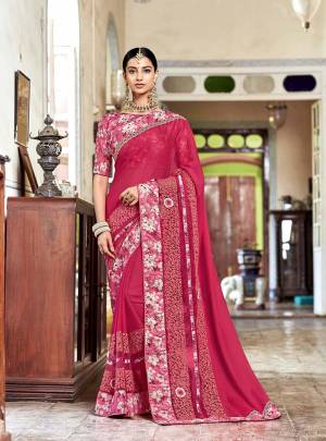 Look Pretty In This Girly Shade With This Designer Dakr Pink Colored Saree Paired With Pink colored Blouse. This Saree Is Fabricated On Georgette Paired With Floral Printed Satin Silk Blouse. 