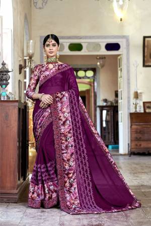 Adorn The Pretty Angelic Look Wearing This Designer Saree In Purple Color Paired With Purple Colored Blouse. This Saree Is Fabricated On Georgette Paired With Satin Silk Fabricated Printed Blouse. 
