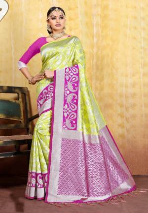 Grab This Pretty Saree For The Upcoming Festive Season With This Heavy Woven Saree Fabricated In Cotton Silk Jacquard Paired With Art Silk Fabricated Blouse. This Saree And Blouse Are Light Weight And Easy To Carry Throughout The Gala.