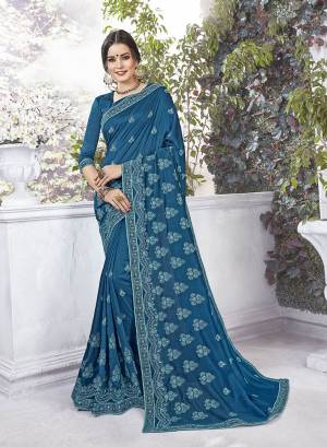 Celebrate This Festive Season Wearing This Designer Silk Based Saree In Blue Color Paired With Blue Colored Blouse. This Saree And Blouse Are Silk Based Beautified With Thread Embroidery And Stone Work .