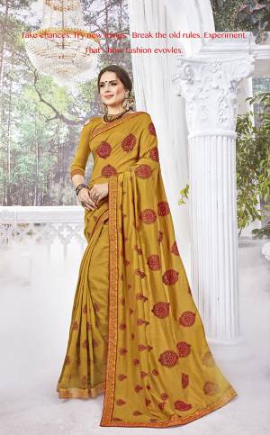 Shine Bright In This Designer Musturd Yellow Colored Saree Paired With Musturd Yellow Colored Blouse. This Saree And Blouse Are Silk Based Beautified With Contrasting Thread Embroidery And Stone Work. 