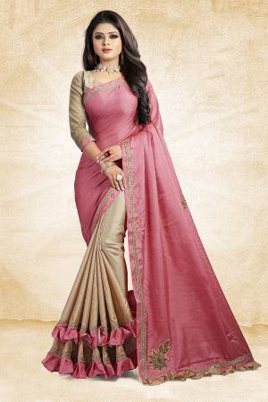 For A Rich And Elegant Look, Grab This Designer Saree In Pink And Beige Color Paired With Beige Colored Blouse. This Saree And Blouse Are Silk Based Beautified with Embroidered Patch Work And Lace Border. Buy Now.
