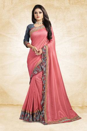 Look Pretty Wearing This Designer Silk Based Saree In Pink Color Paired With Grey Colored Blouse. This Saree And Blouse Are Silk Based Beautified With Lace Border And Printed Frill Over The Border. Buy This Pretty Saree Now.