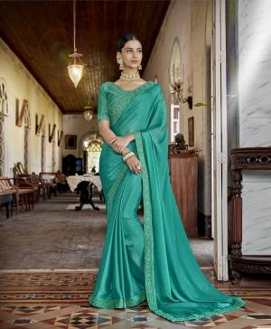 Add This Very Pretty Designer Saree To Your Wardrobe In Sea Green Color Paired With Sea Green Colored Blouse. This Saree Is Fabricated On Satin Chiffon Paired With Art Silk Fabricated Blouse. It Has Elegant Tone To Tone Embroidery With Coding And Thread. 