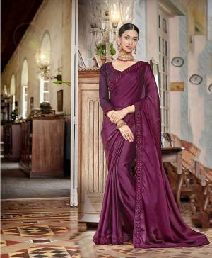 Celebrate This Festive Season With Beauty And Comfort Wearing This Designer Saree In Wine Color Paired With Wine Colored Blouse. This Saree Is Fabricated On Satin Chiffon Paired With Art Silk Fabricated Blouse. It Is Beautified With Coding And Thread Embroidery In Tone To Tone Shade. 