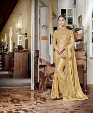 Add This Very Pretty Designer Saree To Your Wardrobe In Beige Color Paired With Beige Colored Blouse. This Saree Is Fabricated On Satin Chiffon Paired With Art Silk Fabricated Blouse. It Has Elegant Tone To Tone Embroidery With Coding And Thread. 