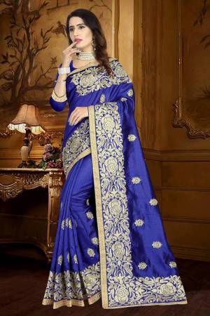 Catch All The Limelight Wearing This Heavy Designer Saree In Royal Blue Color Paired With Royal Blue Colored Blouse. This Saree And Blouse Are Fabricated On Art Silk Beautified With Resham Embroidery And Lace Border. 
