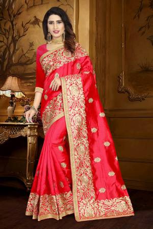 Celebrate This Festive Season Wearing This Rich Silk Based Saree In Red Color Paired With Red Colored Blouse. This Saree And Blouse Are Fabricated On Art Silk Beautified With Embroidery And Lace Border. 