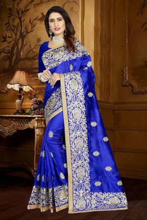 Catch All The Limelight Wearing This Heavy Designer Saree In Royal Blue Color Paired With Royal Blue Colored Blouse. This Saree And Blouse Are Fabricated On Art Silk Beautified With Resham Embroidery And Lace Border. 