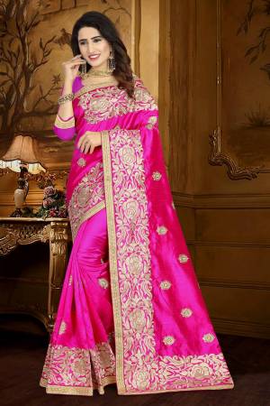 For A Rich And Elegant Look, Grab This Designer Saree In Fuschia Pink Color Paired With Fuschia Pink Colored Blouse. This Saree And Blouse Are Silk Based Beautified With Resham Embroidery And Lace Border. Buy This Rich Looking Saree Now.