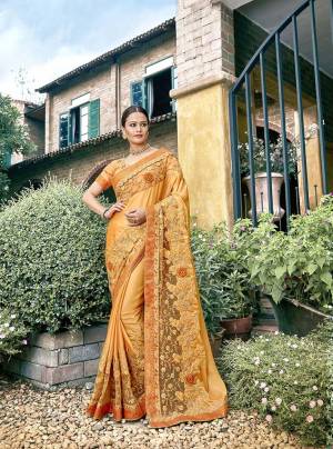 Celebrate This Festive Season With Beauty And Comfort Wearing This Heavy Designer Saree In Musturd Yellow Color Paired With Musturd Yellow Colored Blouse. This Saree Is Fabricated On Silk Georgette Paired With Art Silk Fabricated Blouse. Buy This Saree Now.