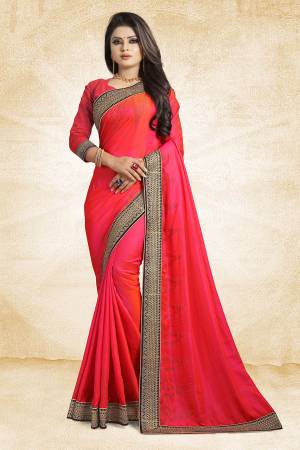 Here Is A Heavy And Elegant Looking Designer Saree In Fuschia Pink Color Paired With Fuschia Pink Colored Blouse. This Saree Is Fabricated On Satin Silk Paired With Art Silk Fabricated Blouse. It Has Heavy Embroidered Lace Border With Stone Work. Buy Now.