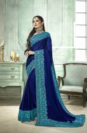 Comfort Comes First When Selecting Clothes, Grab This Light In Weight Royal Blue Colored Saree Paired With Royal Blue Colored Blouse. This Saree And Blouse Are Fabricated On Silk Georgette Beautified With Resham Embroidery And Moti Work. Buy Now.