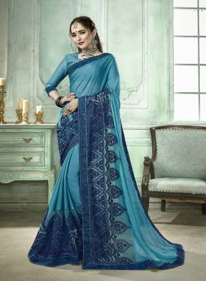Comfort Comes First When Selecting Clothes, Grab This Light In Weight Blue Colored Saree Paired With Blue Colored Blouse. This Saree And Blouse Are Fabricated On Silk Georgette Beautified With Resham Embroidery And Moti Work. Buy Now.