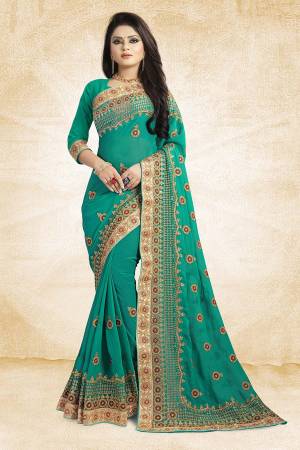 Celebrate This Festive Season With Beauty And Comfort Wearing This Heavy Designer Saree In Sea Green Color Paired With Sea Green Colored Blouse. This Saree Is Georgette Based With Heavy Embroidery Paired With Art Silk Fabricated Blouse. Buy Now.