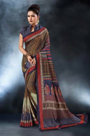 Grab This Pretty Printed Saree For Your Semi-Casuals. This Saree?And Blouse Are Fabricated On Tussar Art Silk Beautified With Digital Prints All Over It, This Saree Is Light In Weight And Easy To Carry All Day Long.