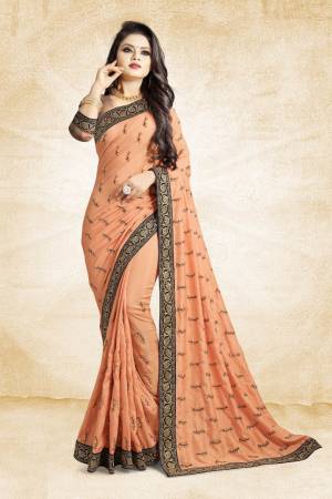 For Rich, Heavy And Elegant Look, This Saree Is Suitable For All. Grab This Designer Saree In Light Orange Color Paired With Light Orange Colored Blouse. This Saree And Blouse Are Silk Based Beautified With Embroidered Buttis And Lace Border. Buy Now.
