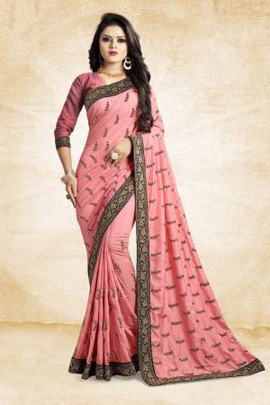 For Rich, Heavy And Elegant Look, This Saree Is Suitable For All. Grab This Designer Saree In Pink Color Paired With Pink Colored Blouse. This Saree And Blouse Are Silk Based Beautified With Embroidered Buttis And Lace Border. Buy Now.