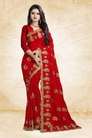 This Festive Season, Grab This Designer Saree In Red Color Paired With Red Colored Blouse. This Saree And Blouse Are Georgette Based Beautified With heavy Attractive Embroidery. 