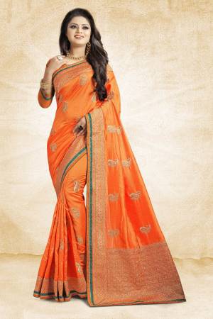 Grab This Designer Silk Based Saree In Orange Color Paired With Orange Colored Blouse. This Saree And Blouse Are Fabricated On Art Silk Beautified With Jari Embroidery And Stone Work. Buy Now.