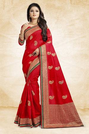 Grab This Designer Silk Based Saree In Red Color Paired With Red Colored Blouse. This Saree And Blouse Are Fabricated On Art Silk Beautified With Jari Embroidery And Stone Work. Buy Now.