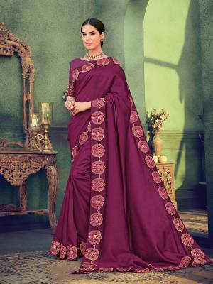 Impress everyone with your amazing Trendy look by draping this Wine color silk fabrics saree. this party wear saree won't fail to impress everyone around you. this gorgeous saree featuring a beautiful mix of designs. Its attractive color and designer heavy embroidered saree, stone design, beautiful floral design work over the attire & contrast hemline adds to the look. Comes along with a contrast unstitched blouse.