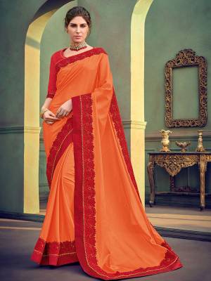 Flaunt your gorgeous look wearing this orange color georgette with glitter saree. Ideal for party, festive & social gatherings. this gorgeous saree featuring a beautiful mix of designs. Its attractive color and designer heavy embroidered saree, stone design, beautiful floral design work over the attire & contrast hemline adds to the look. Comes along with a contrast unstitched blouse.