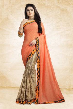 Here Is A Designer Saree In Unique Skirt Pallu Pattern. This Saree Is In Orange And Beige Color Paired With beige Colored Blouse. This Saree Is Fabricated On Jacquard Silk Paired With Art Silk Fabricated Blouse. Its Rich Silk Fabric Earn You Lots Of Compliments From Onlookers. 