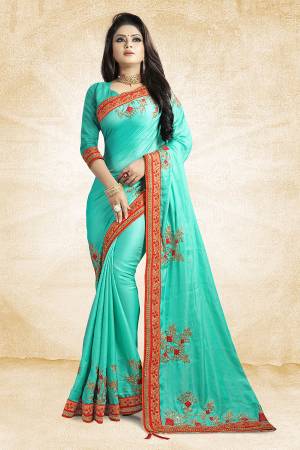 Get Ready For The Upcoming Festive And Season With This Designer Saree In Turquoise Blue Color Paired With Turquoise Blue Colored Blouse. This Saree Is Fabricated On Satin Silk Paired With Art Silk Fabricated Blouse. It Is Beautified With Attractive Embroidery Over The Saree.