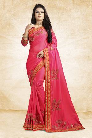 Get Ready For The Upcoming Festive And Season With This Designer Saree In Dark Pink Color Paired With Dark Pink Colored Blouse. This Saree Is Fabricated On Satin Silk Paired With Art Silk Fabricated Blouse. It Is Beautified With Attractive Embroidery Over The Saree.