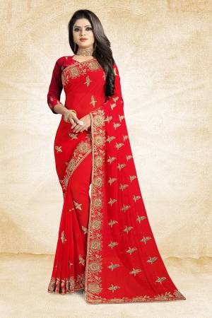 For A Heavy And Elegant Look, This Saree Is Perfect For Your Choice. Grab This Deisgner Saree In Red Color Paired With Red Colored Blouse. This Saree Is Fabricated On Georgette Beautified With Heavy Embroidery Paired With Art Silk Fabricated Blouse. 