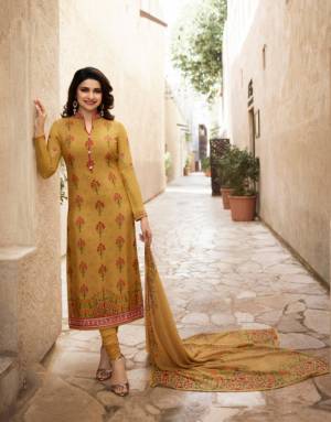 Celebrate This Festive Season With Ease And Comfort Wearing This Designer Straight Suit In Musturd Yellow Color Paired With Musturd Yellow Colored Bottom And Dupatta. Its Top Is Fabricated On Crepe And Georgette Paired With Crepe Bottom And Chiffon Dupatta. Buy This Semi-Stitched Suit Now.