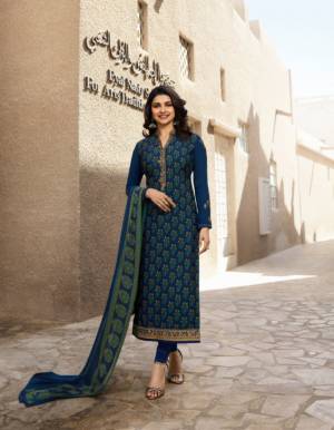 Celebrate This Festive Season With Ease And Comfort Wearing This Designer Straight Suit In Blue Color Paired With Blue Colored Bottom And Dupatta. Its Top Is Fabricated On Crepe And Georgette Paired With Crepe Bottom And Chiffon Dupatta. Buy This Semi-Stitched Suit Now.