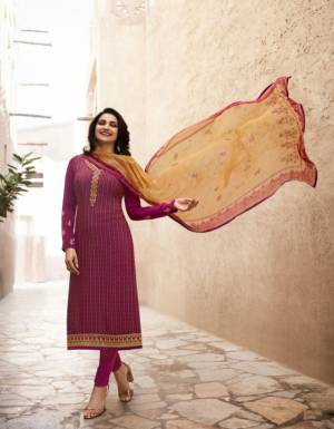 A Must Have Shade In Every Womens Wardrobe Is Here With This Designer Straight Suit In Magenta Pink Color Paired With Contrasting Beige Colored Dupatta. Its Top And bottom Are Fabricated on Crepe Paired With Chiffon Fabricated Dupatta. Buy This Suit Now.