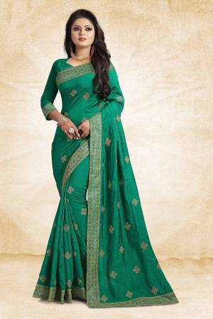 This Festive Season, Grab This Designer Saree In Sea Green Color Paired?With Sea Green Colored Blouse. This Saree And Blouse Are Silk Based Beautified With heavy Attractive Embroidery