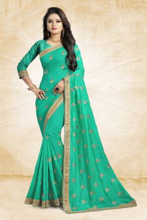 Grab This Designer Silk Based Saree In Sea Green Color Paired With Sea Green Colored Blouse. This Saree And Blouse Are Silk Fabricated Beautified With Jari Embroidery And Stone Work. Buy Now.
