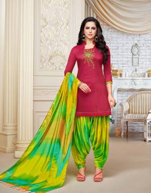 Enhance Your Personality Wearing This Designer Patiala Suit In Dark Pink Colored Top Paired With Green Colored Bottom And Dupatta. This Dress Material Is Fabricated On Soft Silk, Get This Stitched As Per Your Desired Fit And Comfort. 