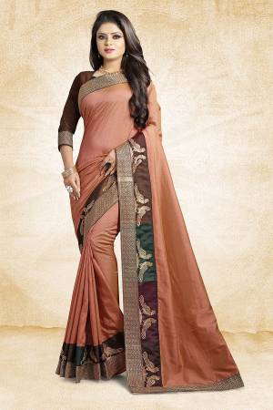 Rich And Elegant Looking Designer Silk Based Saree Is Here In Beige Color Paired With Brown Colored Blouse. This Saree And Blouse are Fabricated On Art Silk Beautified With Emroidered Lace. Buy Now.