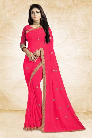 This Festive Season, Look Elegant With This Light Weight Saree In Fuschia Pink Color Paired With Fuschia Pink Colored Blouse. This Saree Is Fabricated On Georgette Paired With Art Silk Fabricated Blouse. It Is Beautified With Embroidered Butti And Lace Border. 