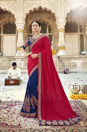 Grab This Beautiful Designer Saree In Red And Blue Color Paired With Contrasting Blue Colored Blouse. This Saree Is Fabricated On Soft Silk Paired With Art Silk And Net Fabricated Blouse. It Is Easy To Drape And Durable. 