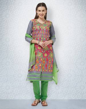 Grab This Designer Straight Suit For Your Casuals In Grey And Green Color. This Dress Material Is Fabricated On Cotton Paired With Chiffon Dupatta. It Is Beautified With Contrasting Thread Work all over The Top. Buy Now.