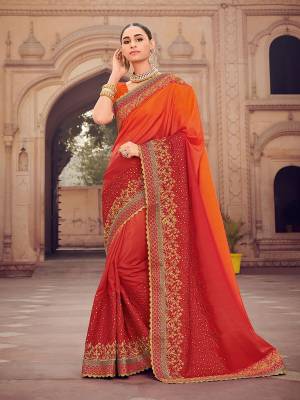 All the Fashionable women will surely like to step out in style wearing this orange and red color silk shaded fabric saree. this gorgeous saree featuring a beautiful mix of designs. look gorgeous at an upcoming any occasion wearing the saree. Its attractive color and designer heavy embroidered design, moti design work, beautiful floral design all over in saree work over the attire & contrast hemline adds to the look. Comes along with a contrast unstitched blouse.