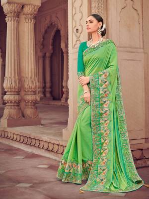 Presenting this Light green color two tone georgette saree. Ideal for party, festive & social gatherings. this gorgeous saree featuring a beautiful mix of designs. Its attractive color and designer heavy embroidered design, moti design work, patch design, beautiful floral design all over in saree work over the attire & contrast hemline adds to the look. Comes along with a contrast unstitched blouse.