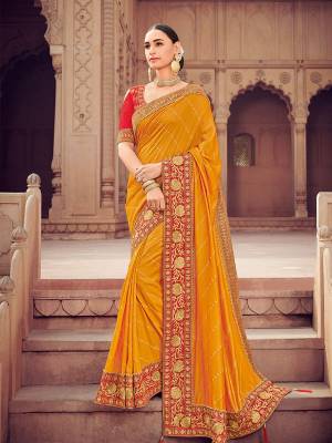 Presenting This Musturd Yellow color two tone silk saree. Ideal for party, festive & social gatherings. this gorgeous saree featuring a beautiful mix of designs. Its attractive color and designer heavy embroidered design, stone design work, beautiful floral design all over in saree work over the attire & contrast hemline adds to the look. Comes along with a contrast unstitched blouse.