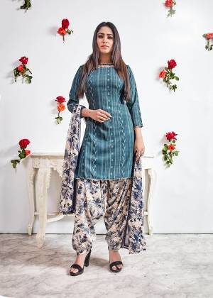 Beat This Heat This Summer With Some Casuals Like These Pretty Dress Materials. This Dress Material Is Fabricated On Crepe Paired With Chiffon Fabricated Dupatta. It Is Beautified With Prints All Over. Buy Now.