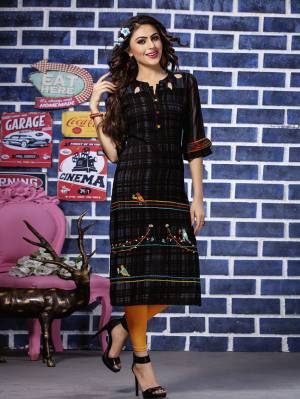 For Your Semi-Casuals Or At Your Work Place, Grab This Readymade Kurti In Black Color Fabricated On Rayon. This Kurti Is Beautified With Thread Work And Available In All Regular Sizes. 