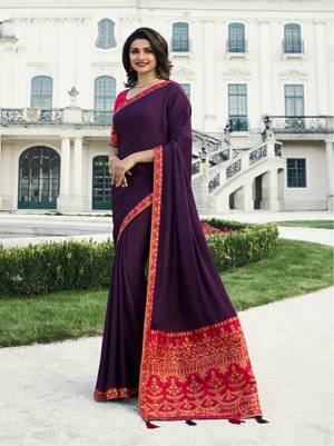Bright And Appealing Color Is Here With This Designer Saree In Purple Color Paired With Contrasting Dark Pink Colored Blouse. This Saree Is Fabricated On Georgette And Jaquard Silk Which Also Gives A Rich And Elegant Look To Your Personality. 