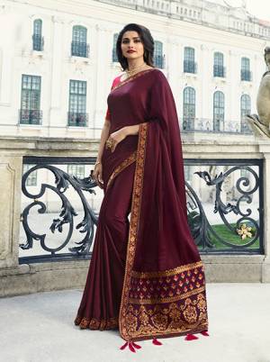 For A Royal Look, Grab This Deisgner Saree In Maroon Color Paired With Dark Pink Colored Blouse. This Saree Is Fabricated On Georgette And Jacquard Silk Paired With Art Silk Fabricated Blouse. It Is Easy To Drape And Carry All Day Long. 