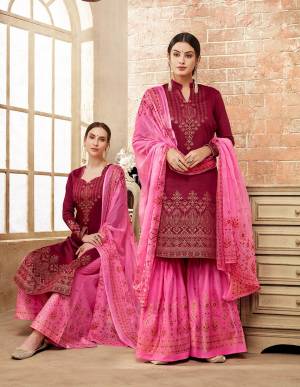 Go With This Shades Of Pink Wearing This Designer Straight Suit In Magenta Pink Colored Top Paired With Pink Colored Bottom And Dupatta. Its Top IS Silk Based Paired With Cotton Bottom And Chiffon Dupatta. 