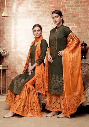 New And Unique Color Pallete Is Here With This Designer Straight Suit In Olive Green Colored Top Paired With Contrasting Orange Colored Bottom And Dupatta. Its Top Is Silk Based Paired With Cotton Bottom And Chiffon Dupatta. 